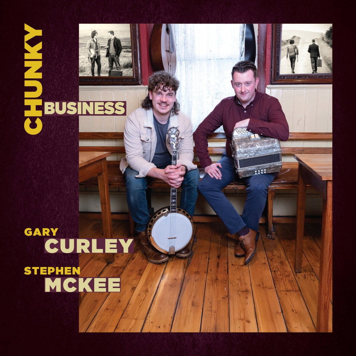 Album cover with two musicians holding a banjo and an accordion, sitting on a wooden bench.