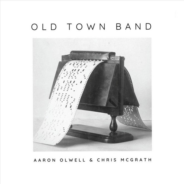Album cover for 'Old Town Band' by Aaron Olwell & Chris McGrath featuring a vintage band machine.
