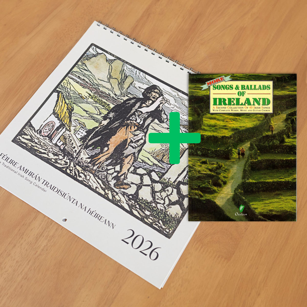 Irish Song calendar, and a plus sign, next to a copy of "More Songs and Ballads of Ireland" on a wooden surface.